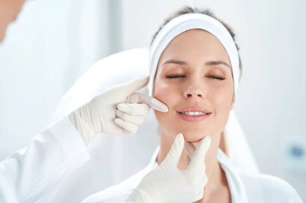 Client enjoying visible results after non-surgical facial treatment at Urban Body Laser in Vancouver
