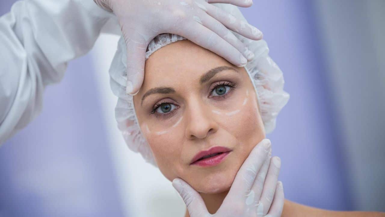 Close-up of a face as a professional performs a detailed skin assessment during treatment