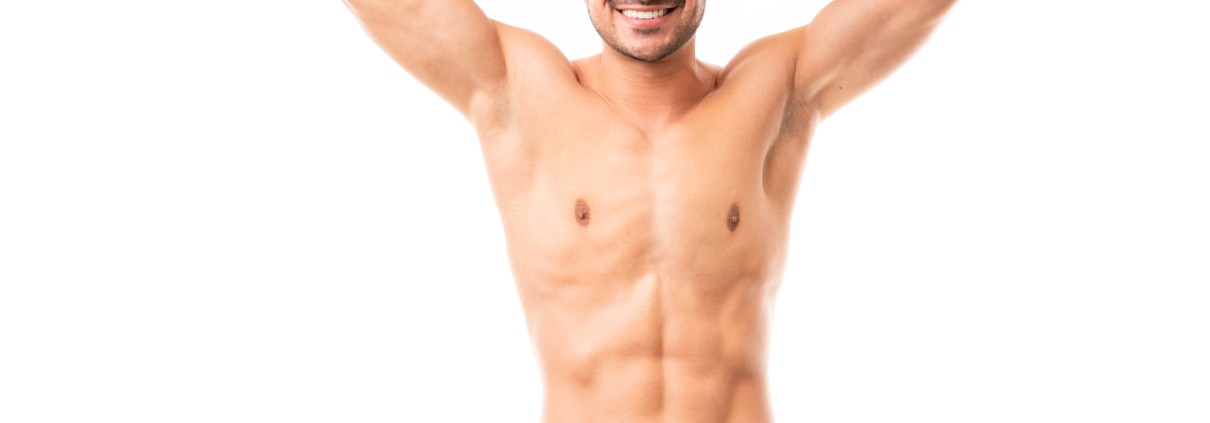 Portrait of a handsome muscular man standing with his hands behind his head and smiling on white background