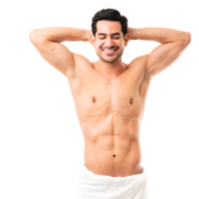 Portrait of a handsome muscular man standing with his hands behind his head and smiling on white background